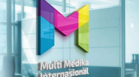 1. Kantor pusat MMIX dengan logo perusahaan, melambangkan strategi baru dan pembagian saham bonus. (Dok. multimed.co.id)